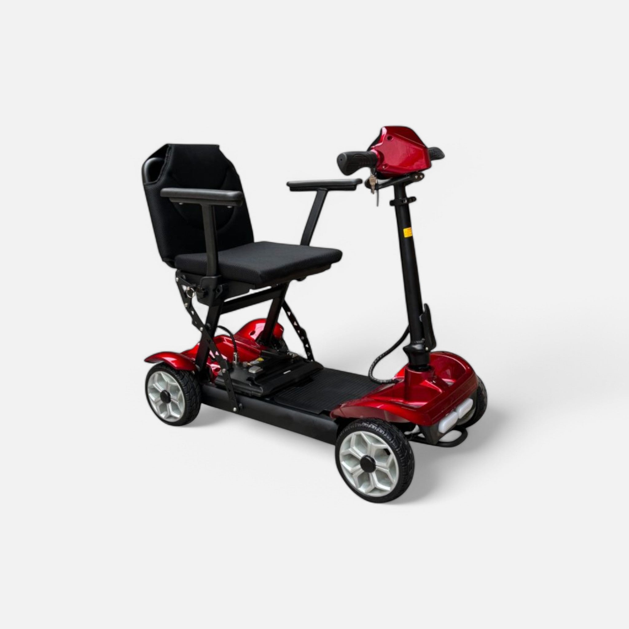 GoVida IVA Traveler 600 Rood, a compact, foldable scooter showcasing its vibrant red design and portable features.
